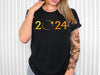 a woman wearing a black t - shirt with the number twenty twenty twenty twenty twenty