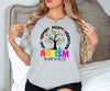 a woman wearing a t - shirt that says autism awareness